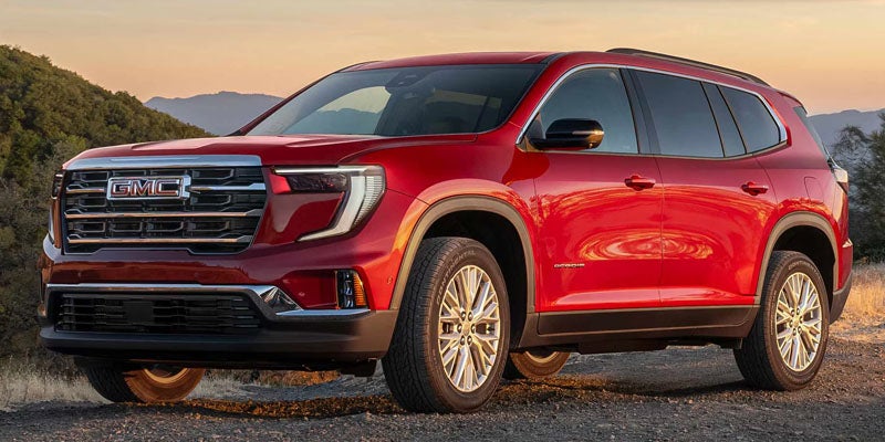 2026 GMC Acadia SUV in red parked outdoors near Bainbridge, GA