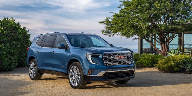 Blue 2026 GMC Acadia showcasing available trim levels in Bainbridge, GA