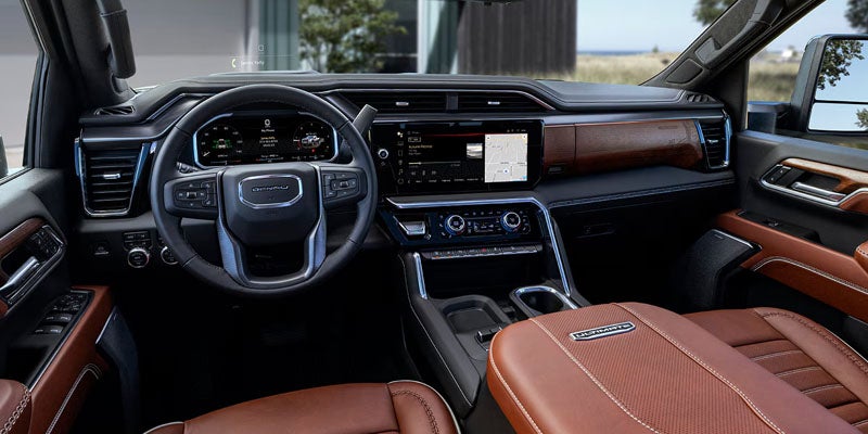 2026 GMC Sierra 2500 HD advanced safety features with digital driver display and intuitive controls at Action GMC