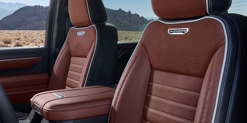 2026 GMC Sierra 2500 HD premium leather interior with comfortable front seating and refined cabin design
